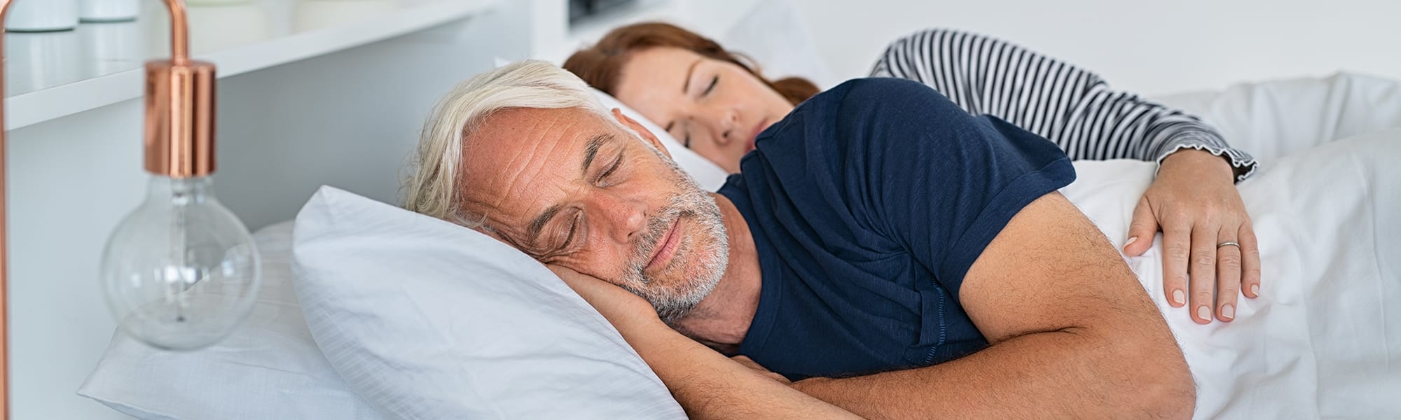 A couple enjoying restul sleep after a luxury massage chair session